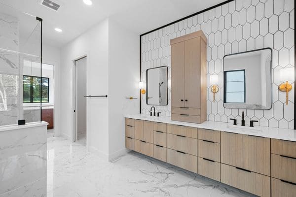 Before and after bathroom renovation showing upgrade from basic to spa-like design with smart features