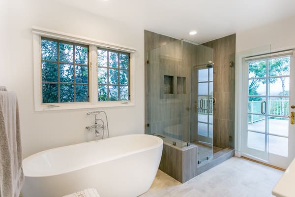 Sustainable bathroom design featuring reclaimed wood vanity and water-saving fixtures